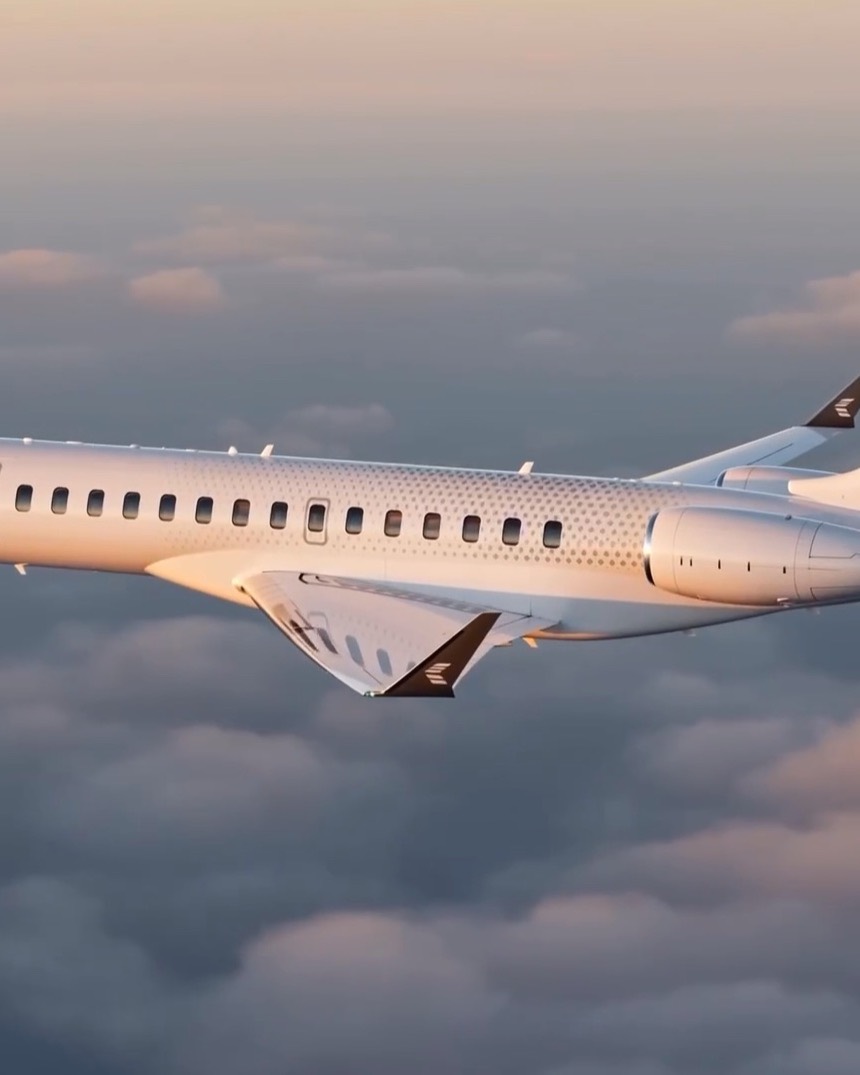 A private jet above a sea of cloud